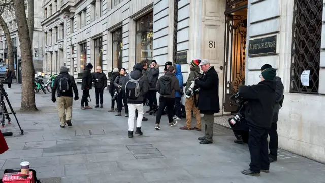 Photographers and cameramen outside Aldwych House, central London, where the Post Office inquiry's taking place