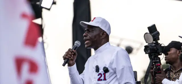 Opposition candidate Martin Fayulu talks to his supporters during a final campaign rally in Kinshasa, on December 16, 2023. DR Congo is scheduled to hold presidential and parliamentary elections on December 20, 2023, with 23 candidates running for president, amid a tense political climate and relentless fighting in the east of the country.