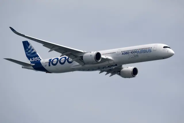 An Airbus A350 flying