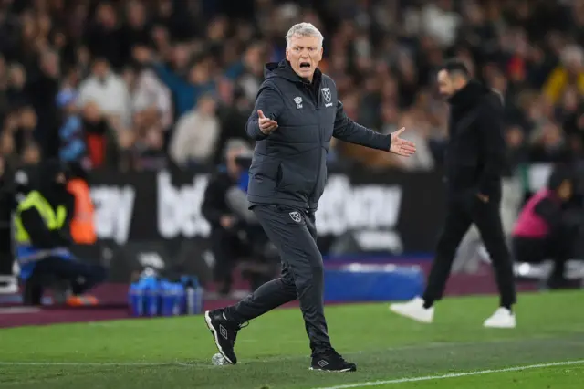 Moyes remonstrates with officials after a contentious call.