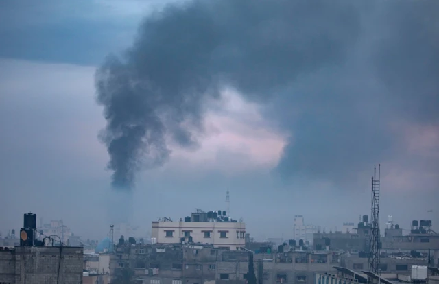 Smoke rises following Israeli air strikes in Khan Younis, southern Gaza Strip, 2 January 2024