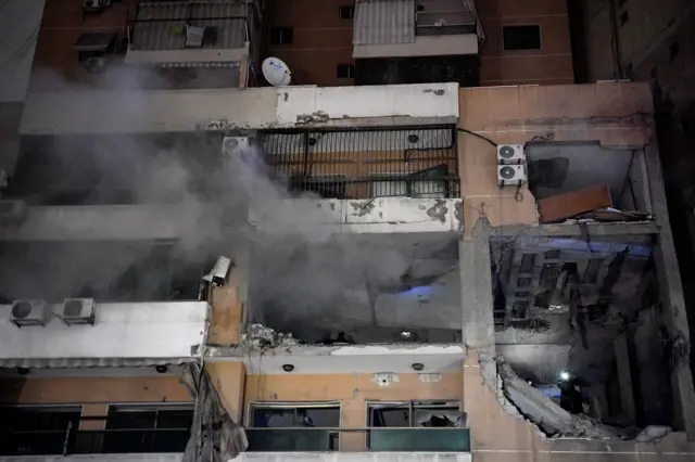 Smoke billowing from a building