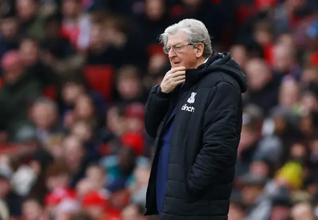 Roy Hodgson scratches his chin pensively on the side line.