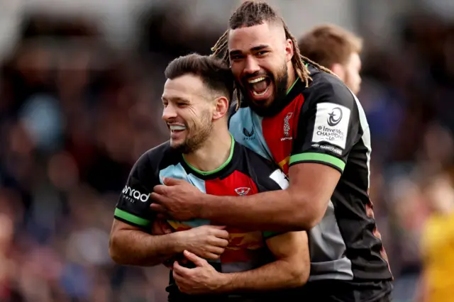 Danny Care celebrates his try with teammate Chandler Cunningham-South.