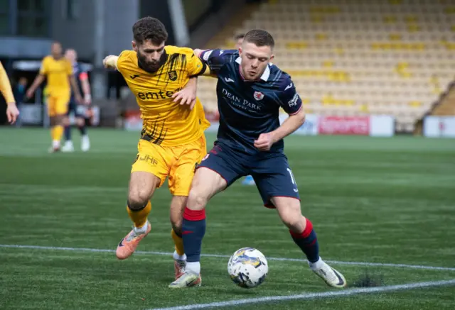 Livingston's Jamie Brandon and Raith Rovers' Callum Smith in action during a Scottish Gas Scottish Cup fourth round match between Livingston and Raith Rovers at the Tony Macaroni Arena , on January 20, 2024, in Livingston, Scotland.