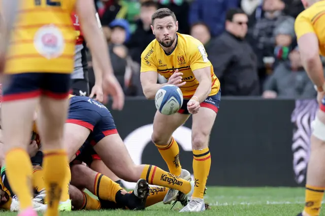 Ulster's John Cooney makes a pass for Ulster.