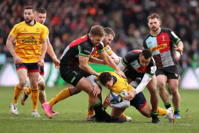 Ulster's Billy Burns is tackled.