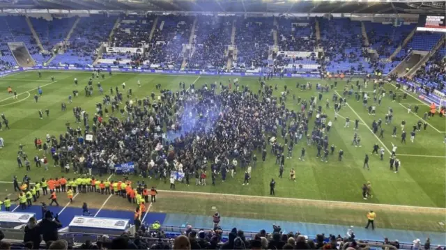 Reading fans pitch invasion