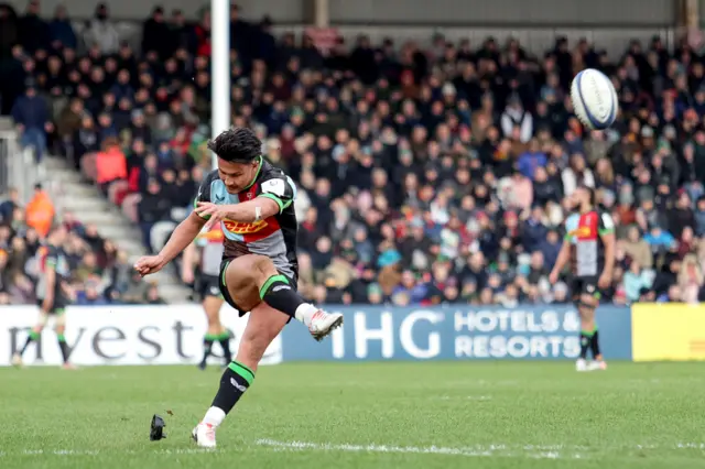 Harlequins' Marcus Smith kicks a conversion.