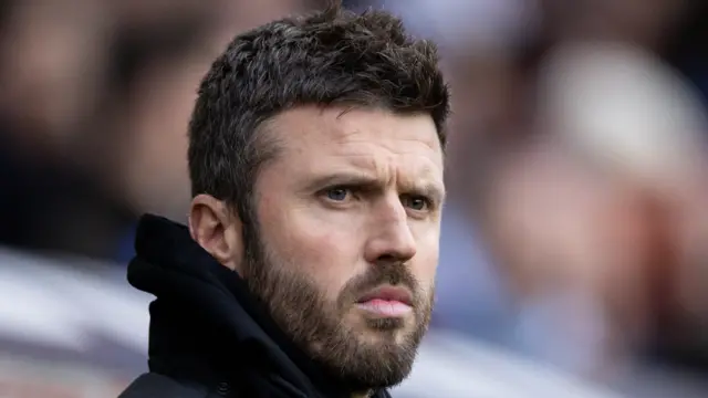 Michael Carrick on the touchline