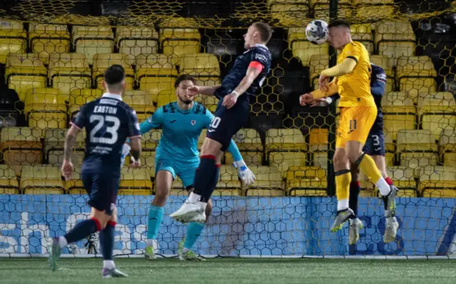 Daniel MacKay headed in Livingston's winning goal as Kevin Dabrowski attempts to save.