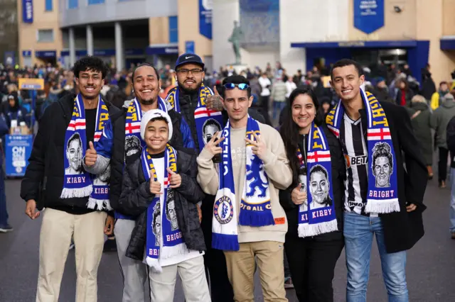 Fans wearing scarves