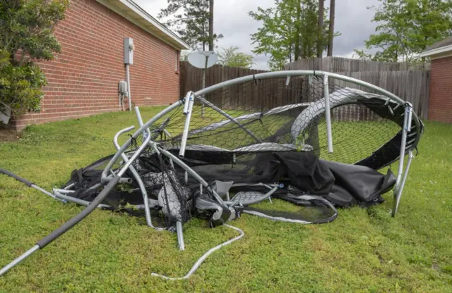 Mangled trampoline after storm