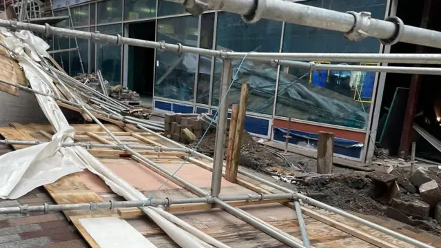 Pedestrians were advised to avoid Castle Lane in central Belfast on Sunday afternoon due to falling scaffolding