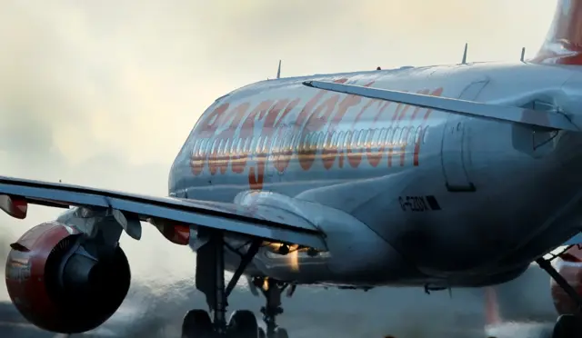 stock image of plane landing at Liverpool's airport