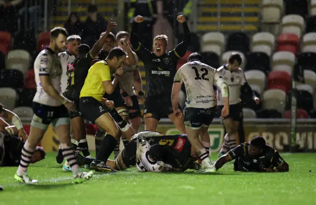 Sharks celebrate their try