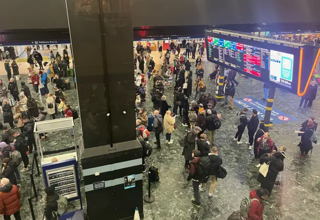 People waiting at Euston station