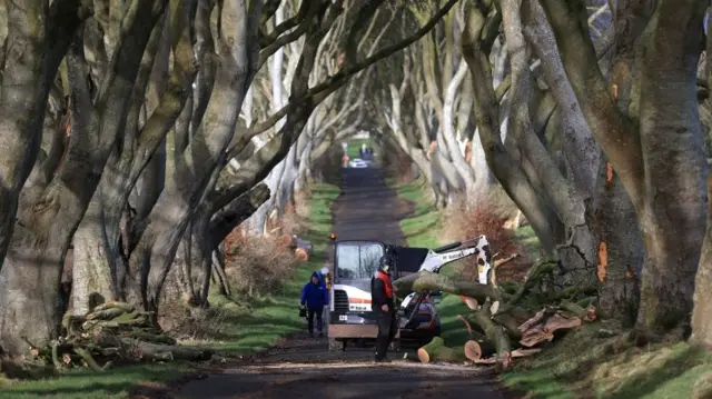 Workmen continue their clear up operation