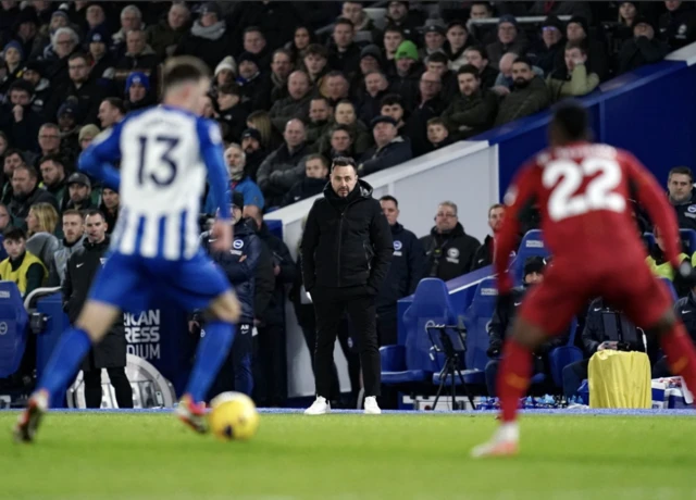 Roberto Di Zerbi looks on from the touchline
