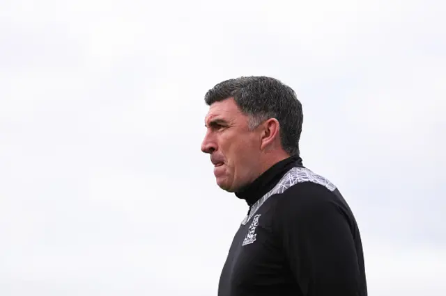 Southend United manager Kevin Maher looks on