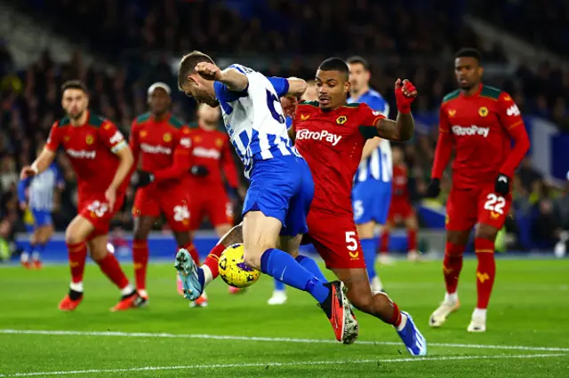 James Milner of Brighton & Hove Albion battles for possession with Mario Lemina