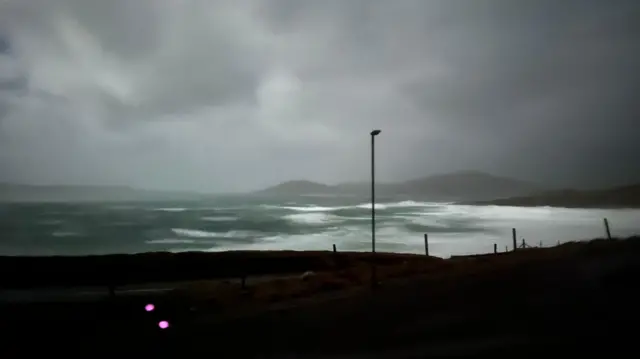 Stormy sea with grey clouds in the sky