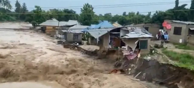 A swollen river after two days of heavy rains and floods in Dar es Salaam and other parts of Tanzania between 20 and 21 January 2024