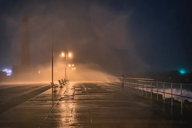 Waves crash onto Clarence Esplanade in Southsea