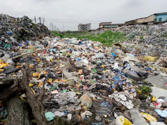 View of Idi-Araba abattoir canal, in Lagos, Nigeria, on 21 August 2019 filled with dumps of used foams, empty food containers, float and block drainages following heavy rainy seasons.