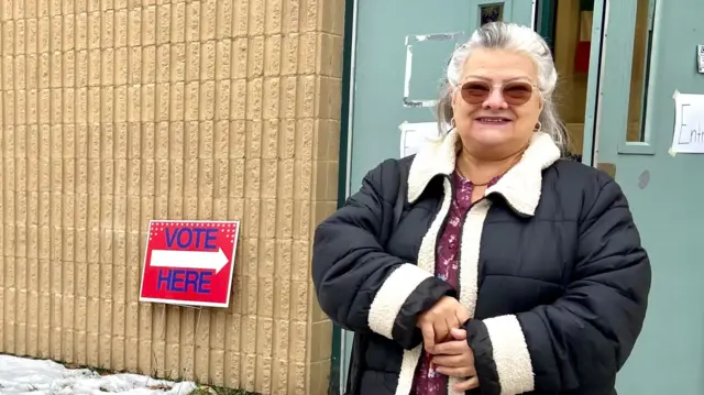 New Hampshire local JulieAnn Pagliarulo prepares to vote