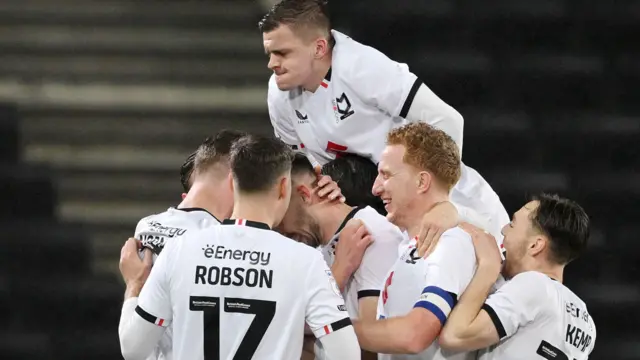 MK Dons celebrate