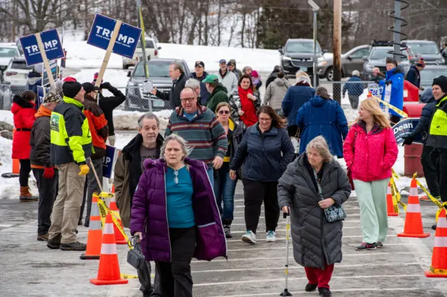 Lines of people heading to vote in New Hampshire.