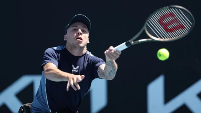 Andy Lapthorne hits a forehand shot