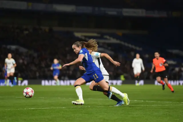 Reiten bursts past a Madrid defender on the left wing.