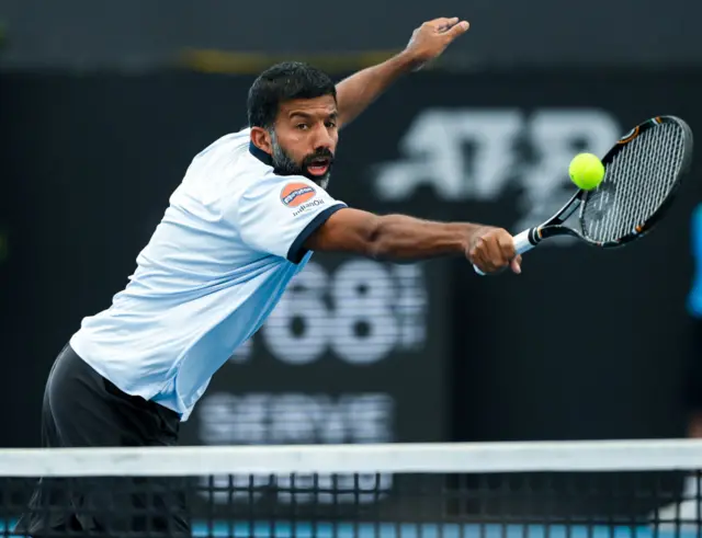 Rohan Bopanna hits a backhand shot