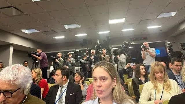 Journalists sitting to listen to Sergei Lavrov's press conference