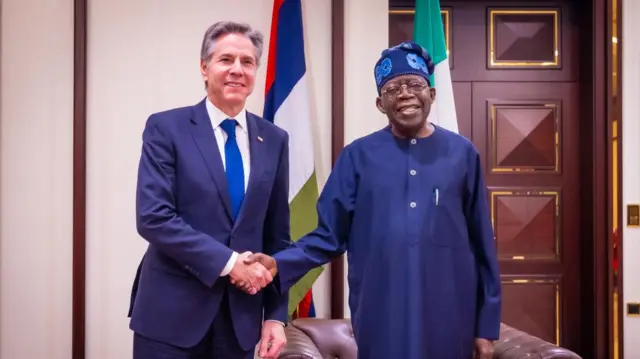 A handout photo made available by the Presidential Villa, the official residence of the President of Nigeria, shows US Secretary of State Antony Blinken (L) meeting with Nigeria's President Bola Tinubu (R) at the Presidential Villa in Abuja, Nigeria, 23 January 2024