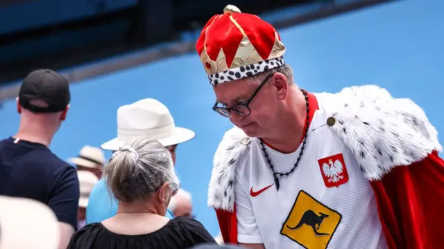 Polish fan dressed as a king in the crowd