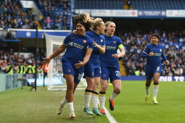 Lauren James celebrates in front of the away end after scoring v Man Utd