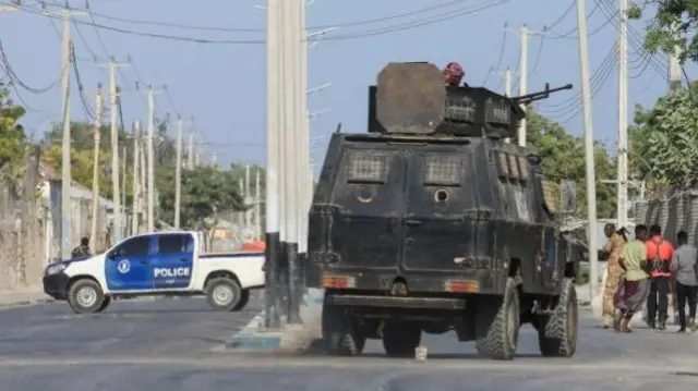 Security forces patrol outside a building which was attacked by suspected Al Shabaab militants in the Somalia's capital Mogadishu, on February 21, 2023.