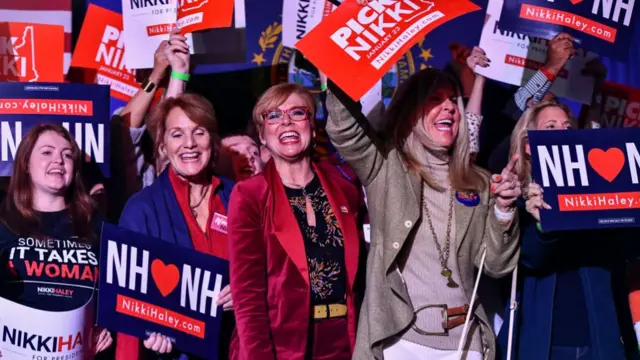 Supporters of Republican presidential hopeful Nikki Haley react while she speaks after results came in for the New Hampshire primaries during a watch party in Concord, New Hampshire