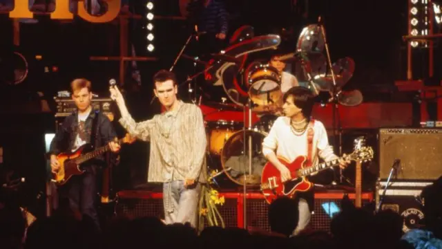 Johnny Marr (right) with Andy Rourke (left) and lead singer Morrissey in 1984