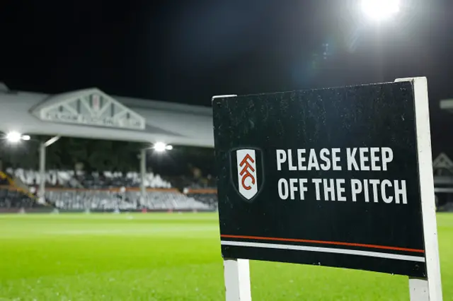 Please keep off the pitch' sign before the Carabao Cup Semi Final