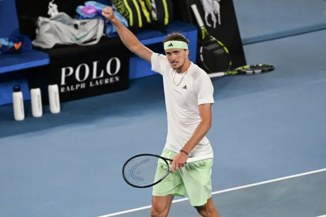 Alexander Zverev celebrates by raising him right arm and fist in the air