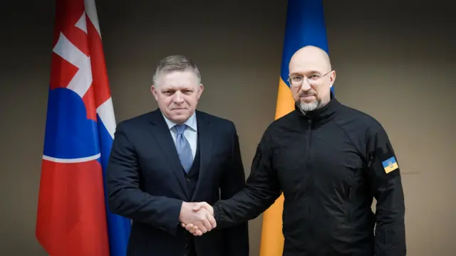 Ukraine's Prime Minister Denys Shmyhal and Slovakia's Prime Minister Robert Fico shaking hand after their meeting in Ukraine, 24 January 2024