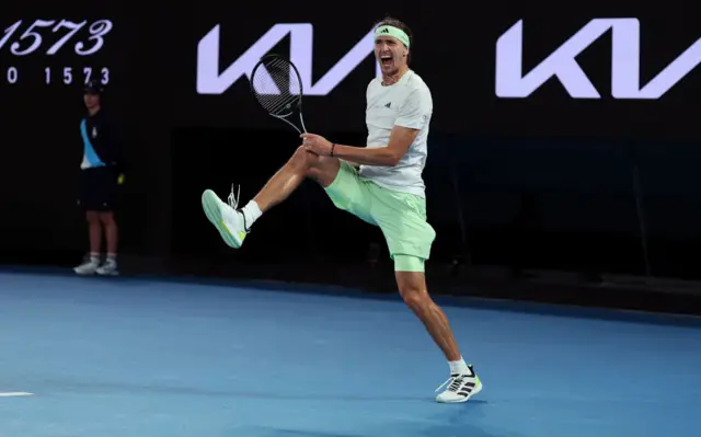 Alexander Zverev celebrates and screams after winning match point