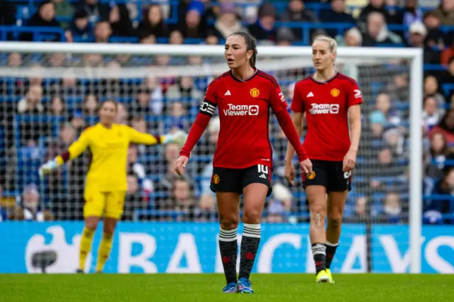 United players stand forlorn after conceding against Chelsea again.