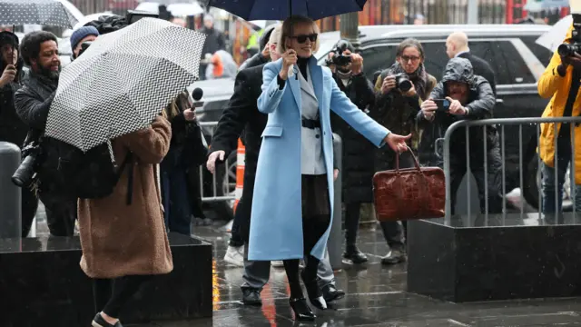 E Jean Carroll walks outside Manhattan Federal Court,