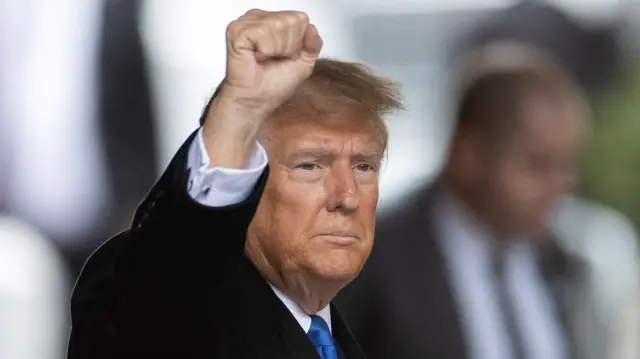 Former U.S. President Donald Trump greets to his supporters, as he arrives from his second civil trial after E. Jean Carroll accused Trump of raping her decades ago, outside a Trump Tower in the Manhattan borough of New York City, U.S., January 25, 2024.