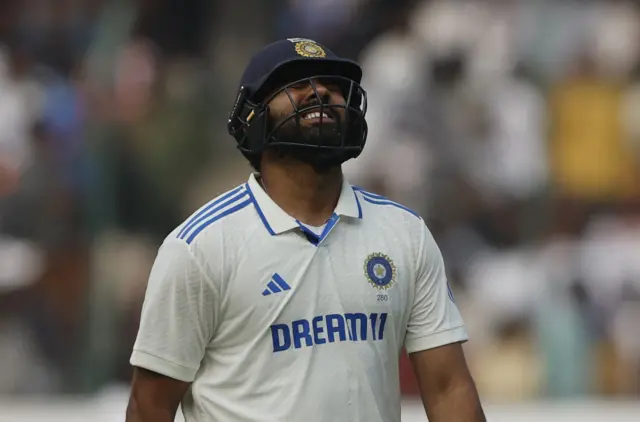 India's Rohit Sharma looks dejected after being dismissed